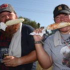 These two enthusiasts enjoy traditional corn-on-the-cob at the Lemoore Lions annual Brewfest Saturday at Lemoore Lions Park.